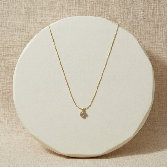 Minimal Bloom Necklace on cream beige linen background