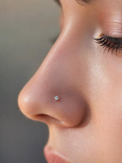 Close-up of a clear-stone nose stud worn on the nose