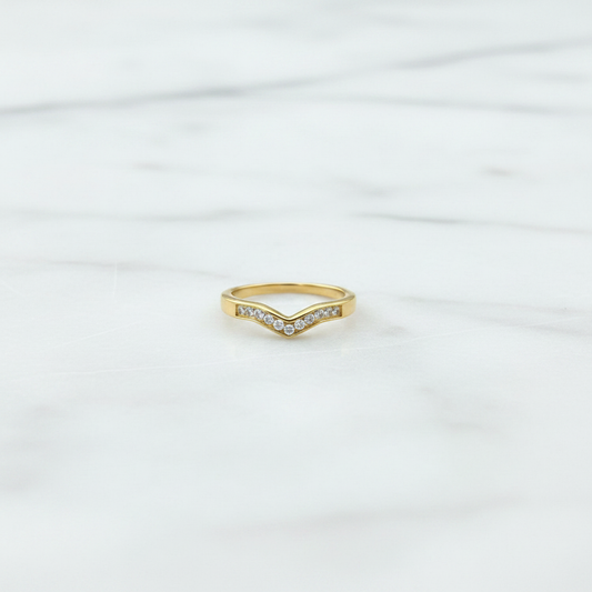 Lima V Ring upright on white marble surface product shot