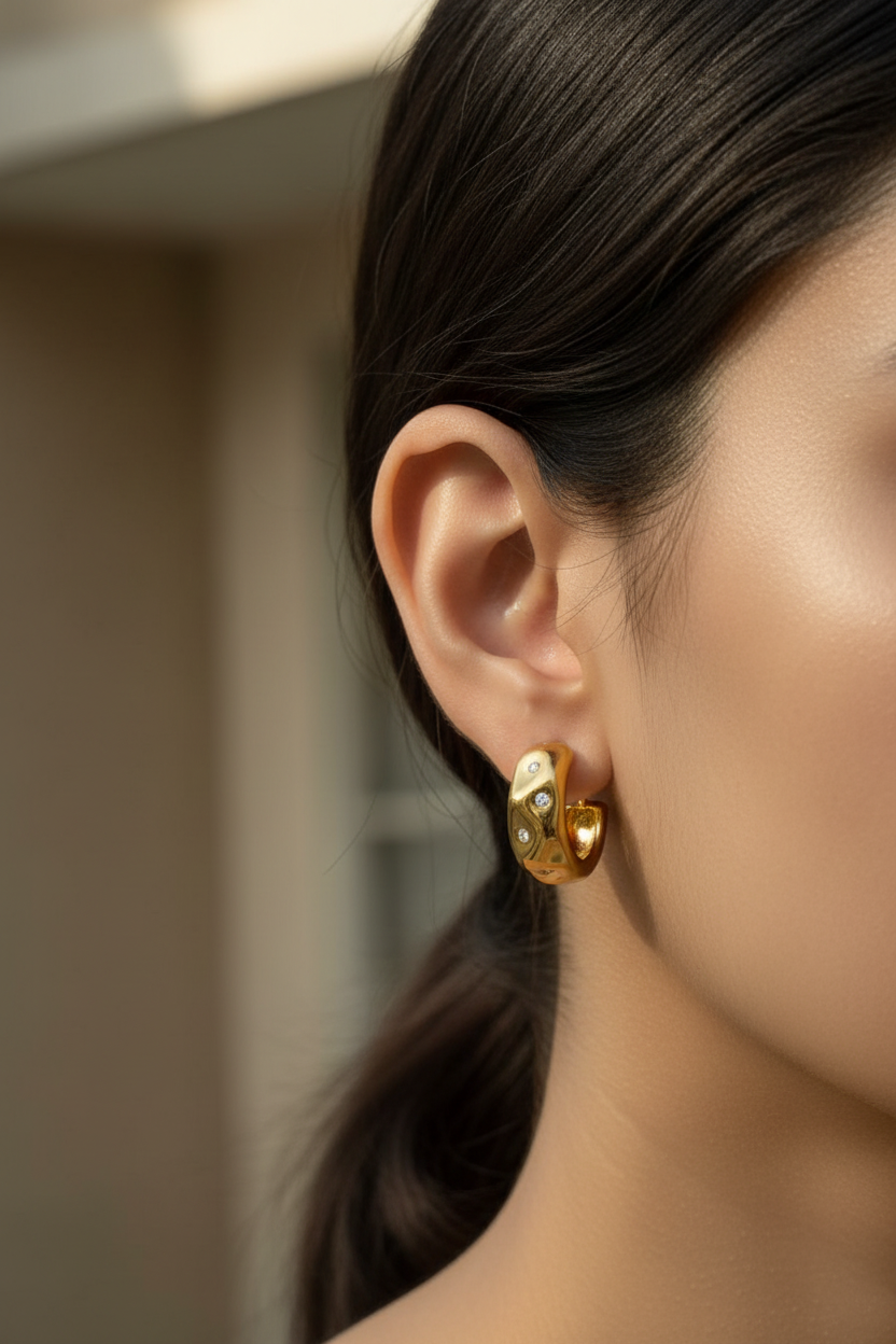Molten Gold Crystal Hoops worn on girl's ear