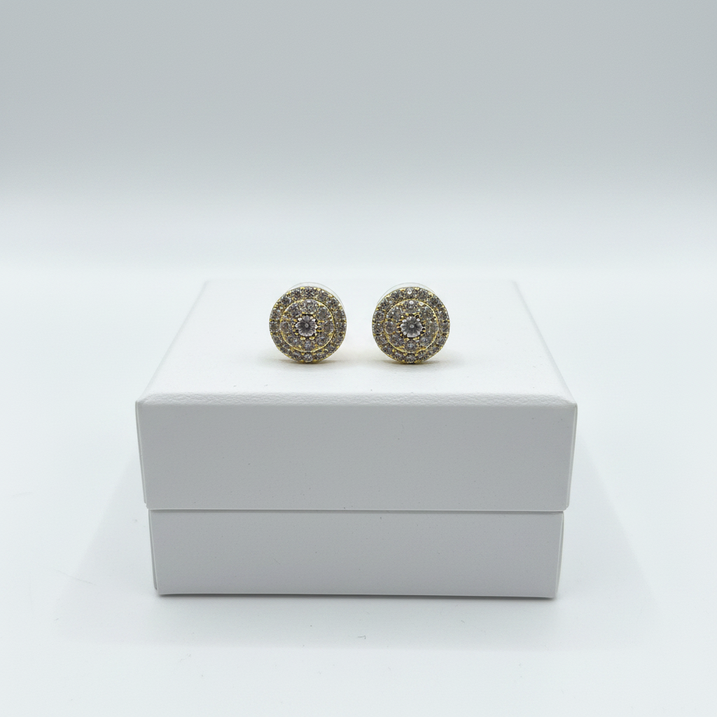 Pavé cluster stud earrings on white jewelry box