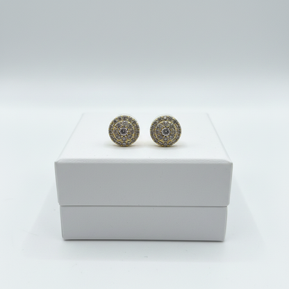 Pavé cluster stud earrings on white jewelry box