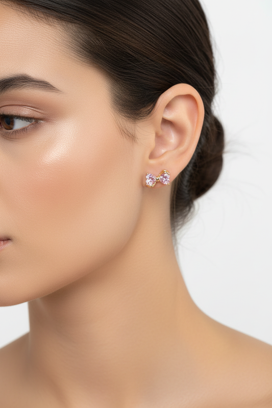 Crystal bow earrings worn on ear