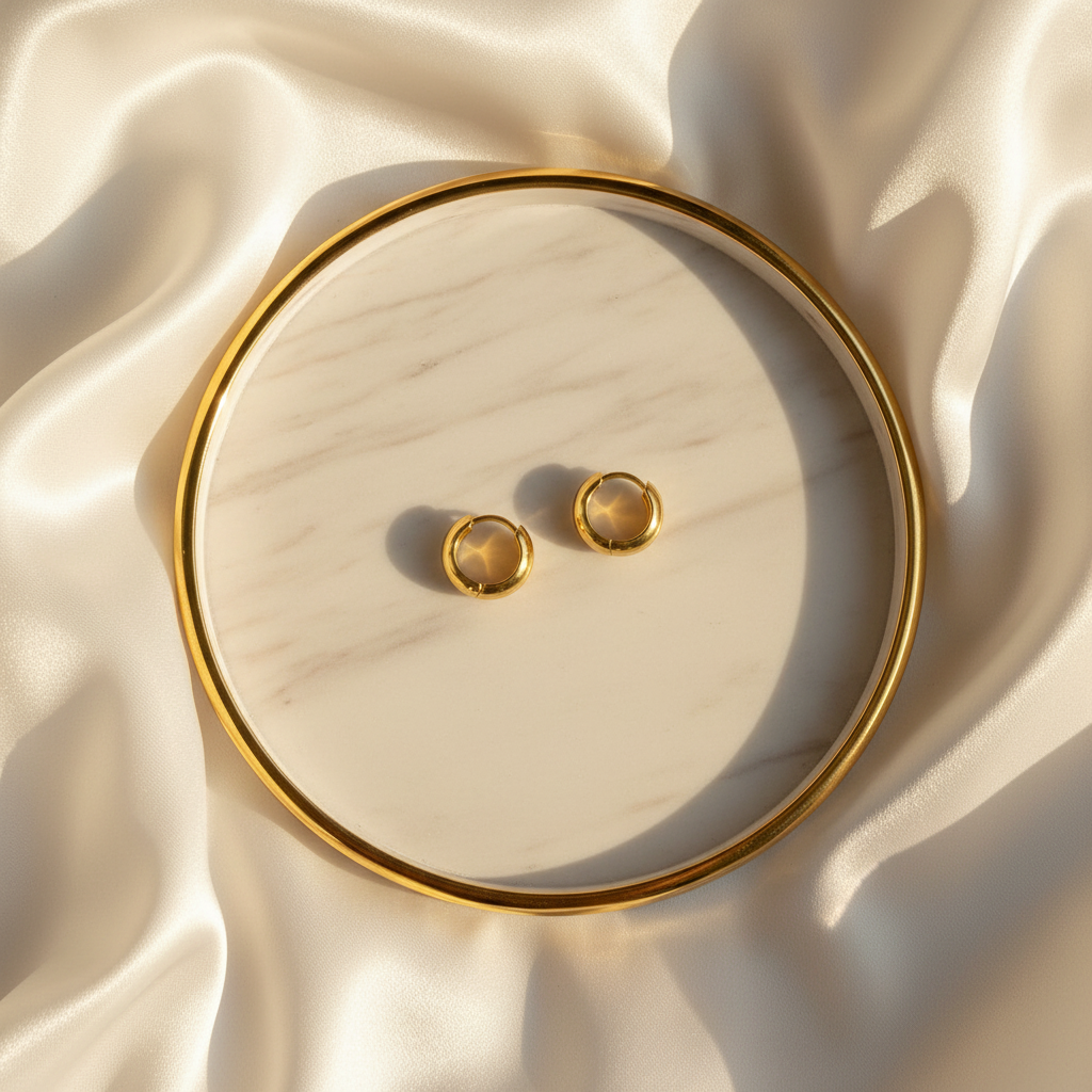 Halo Core Hoops – flat-lay on marble tray with silk