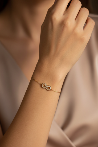 Infinity Crystal Gold Bracelet worn on wrist
