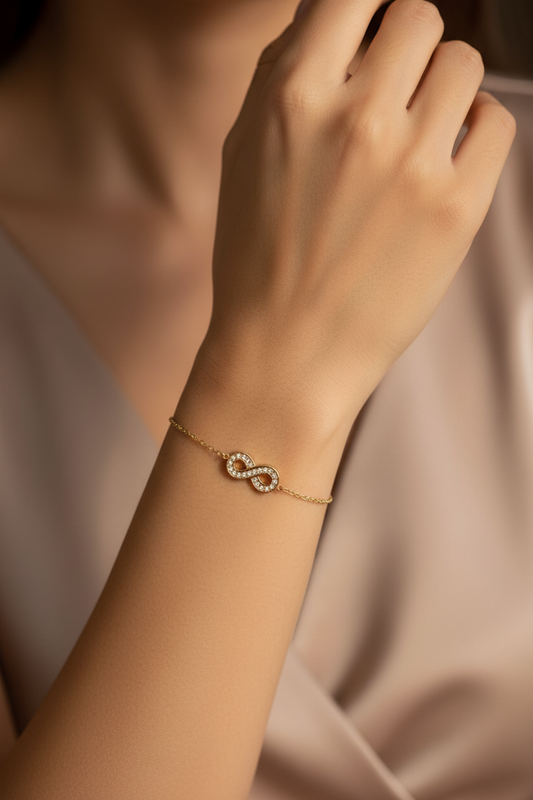 Infinity Crystal Gold Bracelet worn on wrist