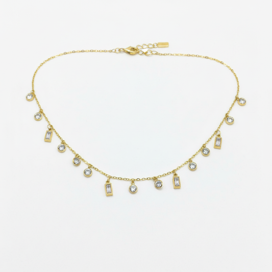 Zenith Charm Necklace – flat lay on white surface