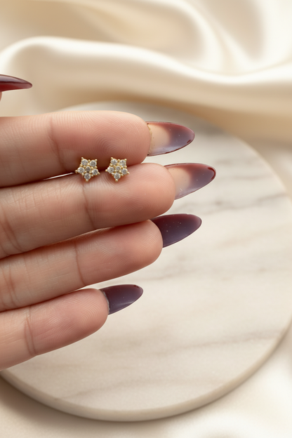 Lil Luxe Flower Studs on marble silk background