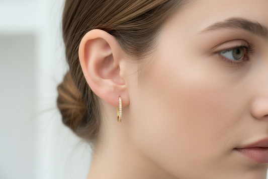 Adelia Huggies worn on model ear