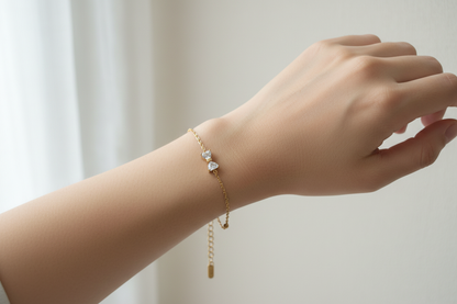 Bow bracelet worn on girl's wrist – lifestyle shot