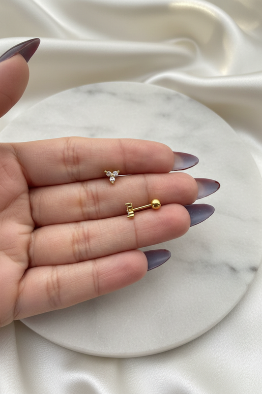 Luna Leaf Crystal Studs on marble silk background